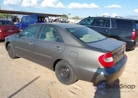 2003 Toyota Camry Le z USA, uszkodzony, nr VIN 4T1BE30K13U725595